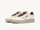 Zapatillas bajas Medallist en piel higo y plateada.